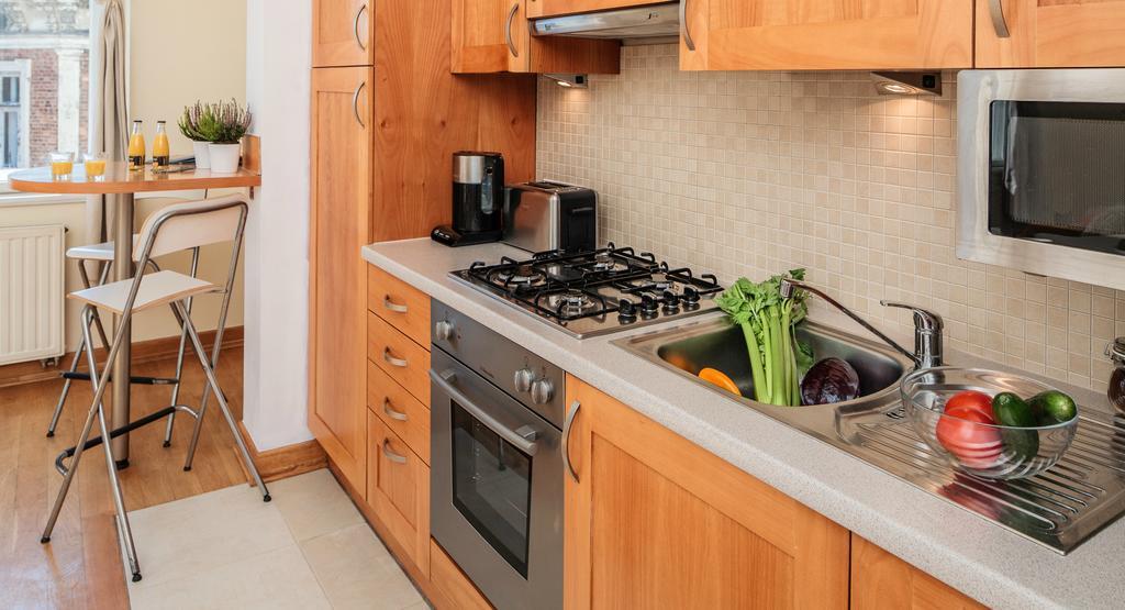 M Apartments Krakov Pokoj fotografie