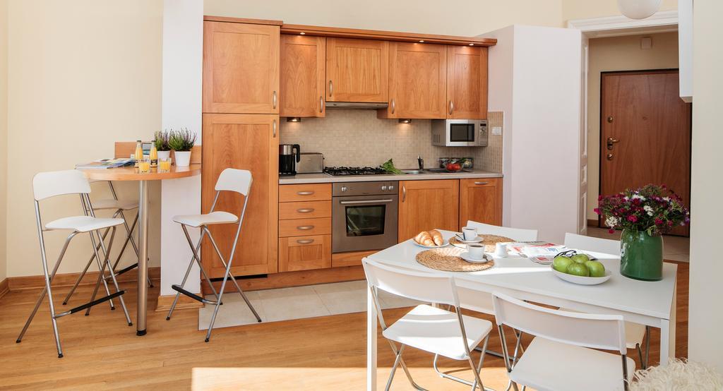 M Apartments Krakov Pokoj fotografie